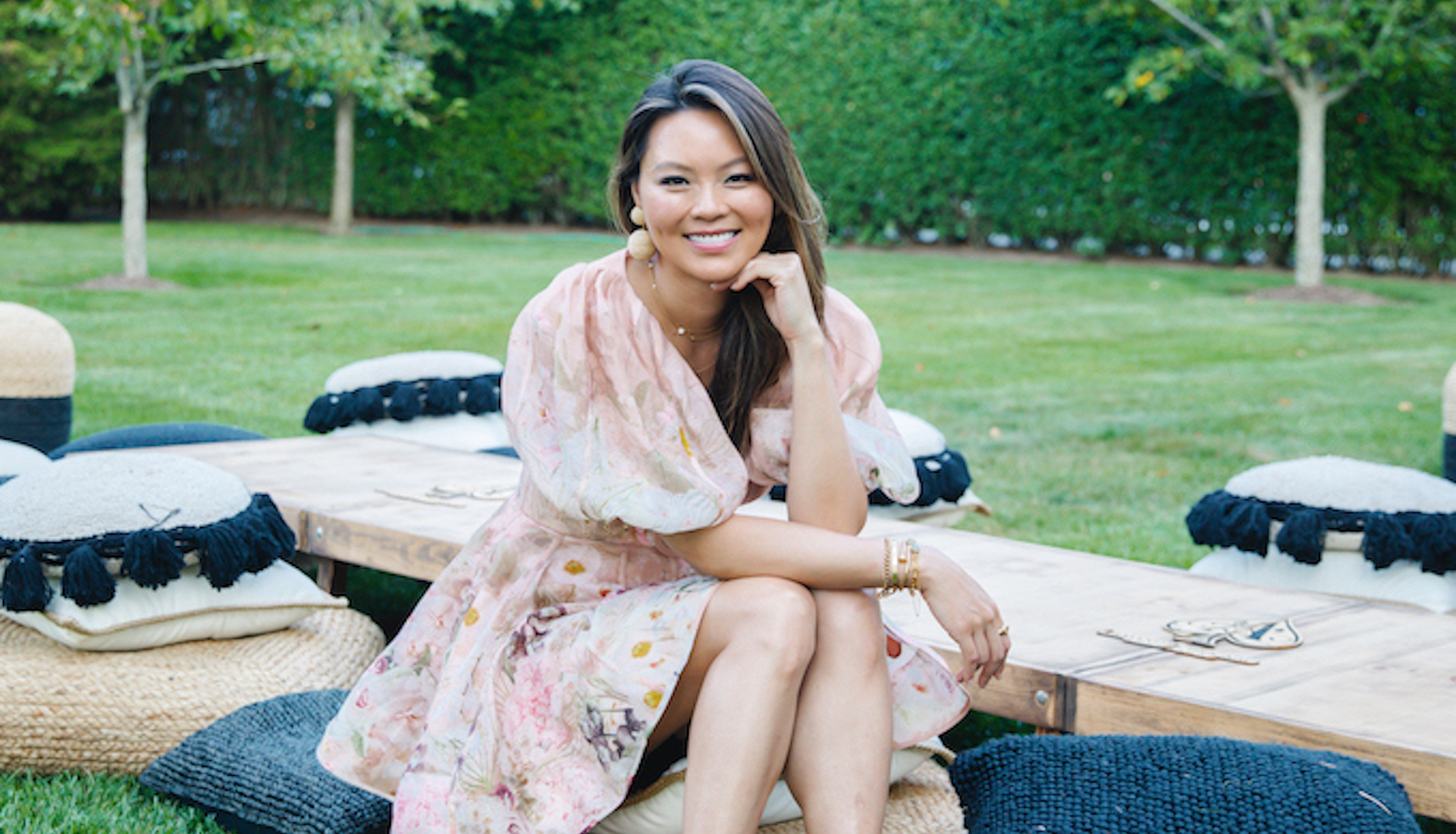 woman sitting on lawn