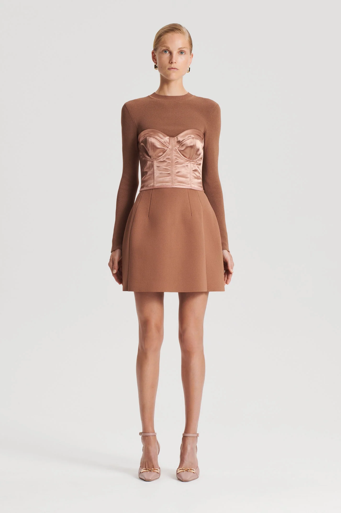 model in tan outfit