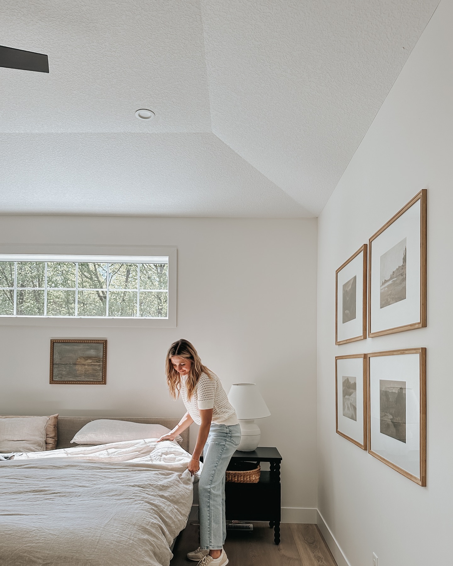 woman making a bed