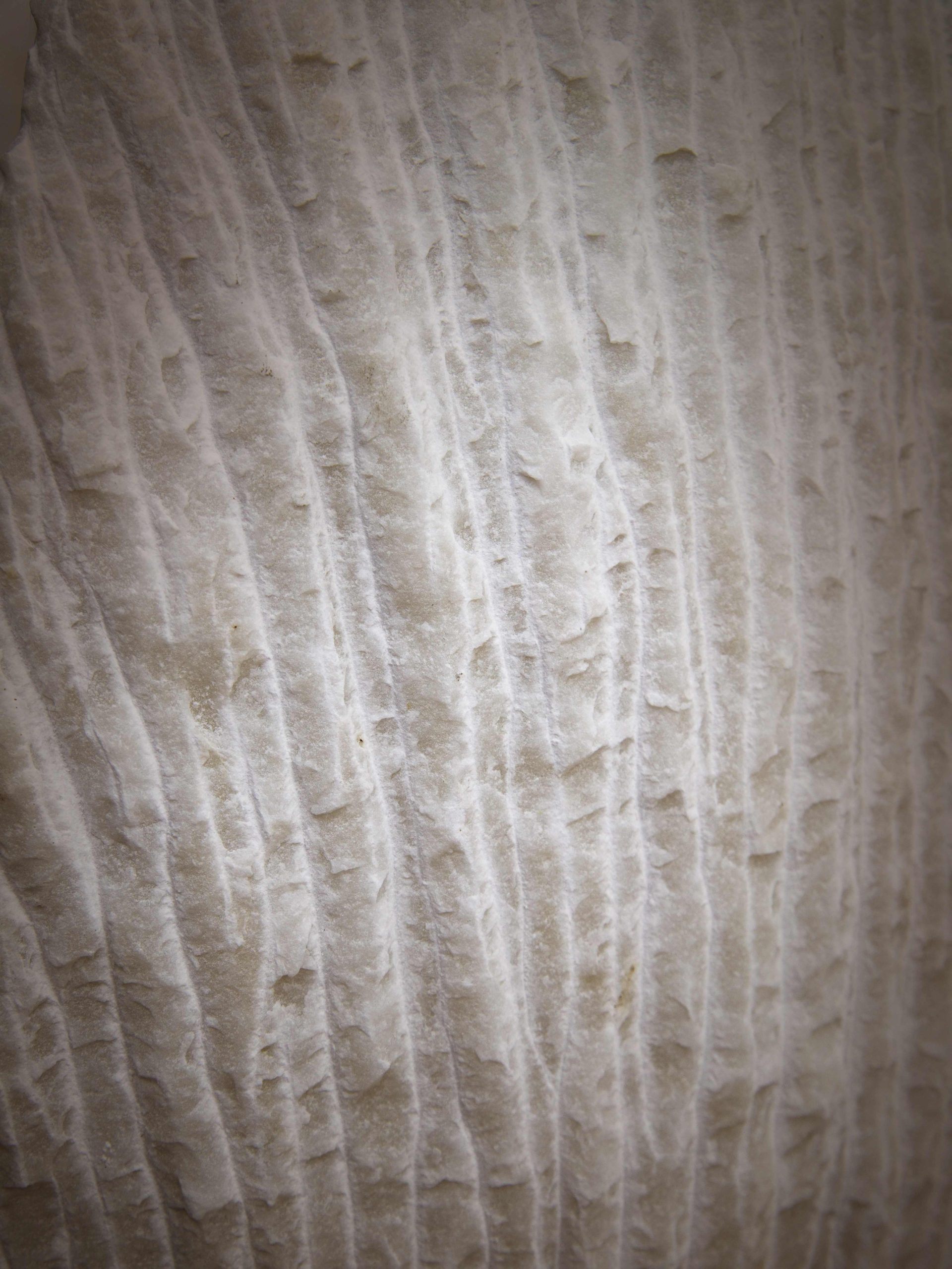 Carved white Italian marble details