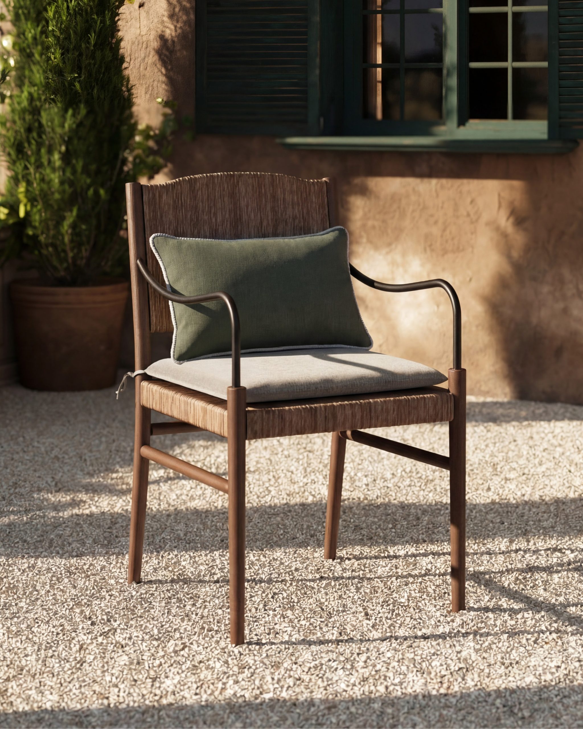 outdoor dining chair with lumbar pillow